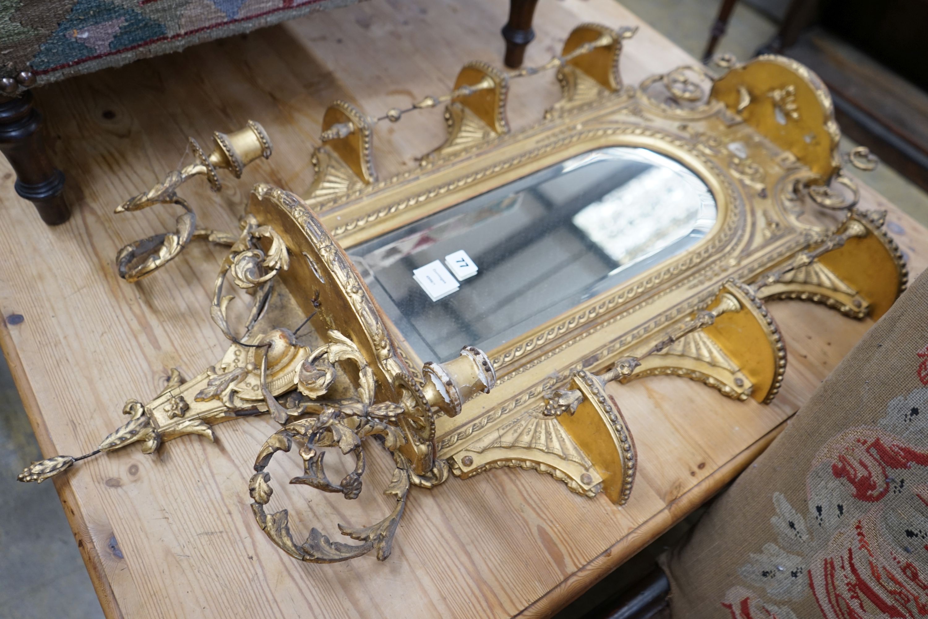A Victorian giltwood and gesso girandole, width 56cm, height 84cm